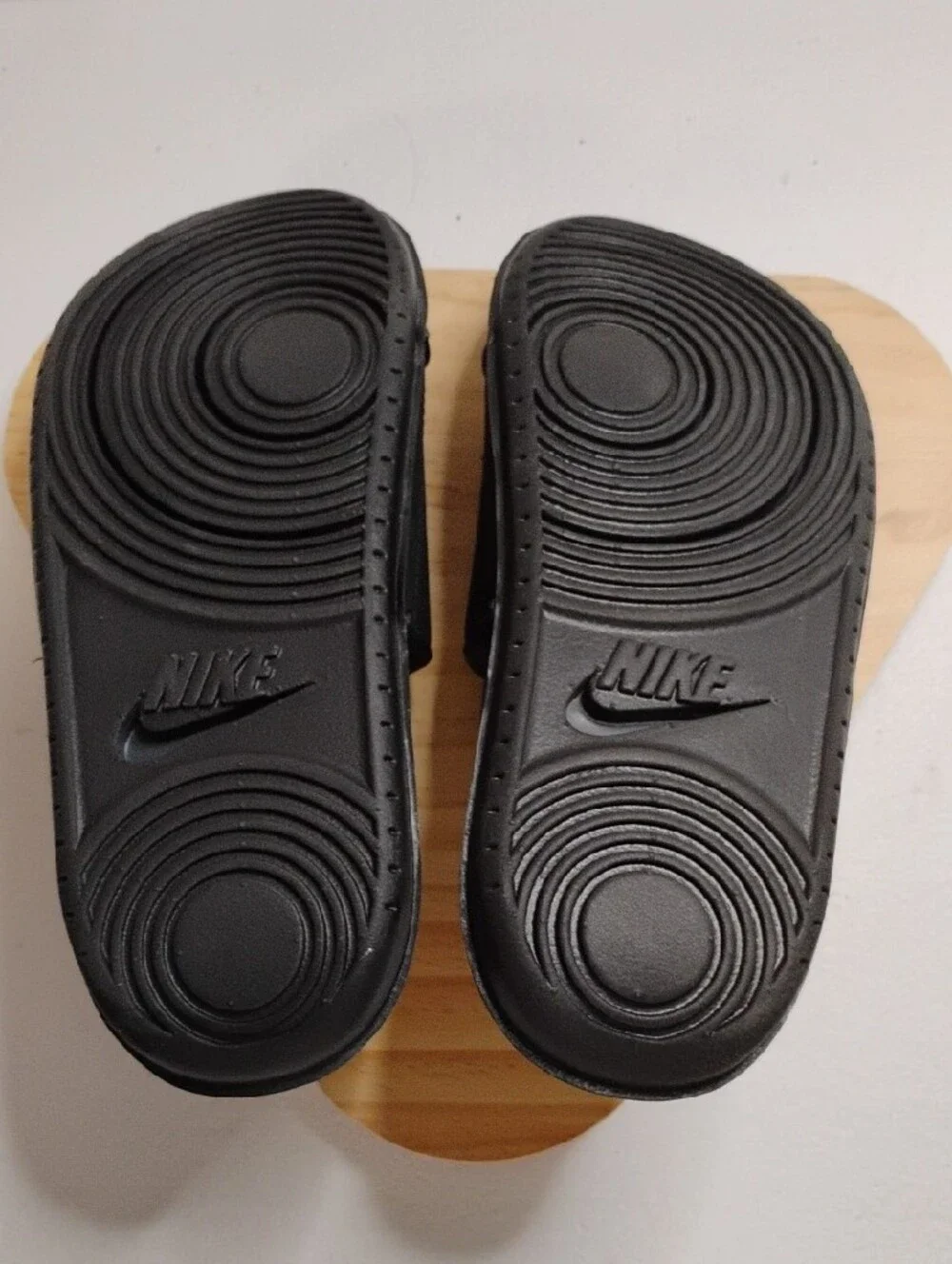 Nike Black Slide Sandals with Embossed NIKE Strap
